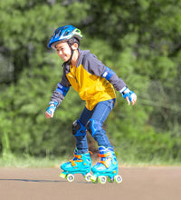 Load image into Gallery viewer, Turquoise Quad Skates With Shark Wheels
